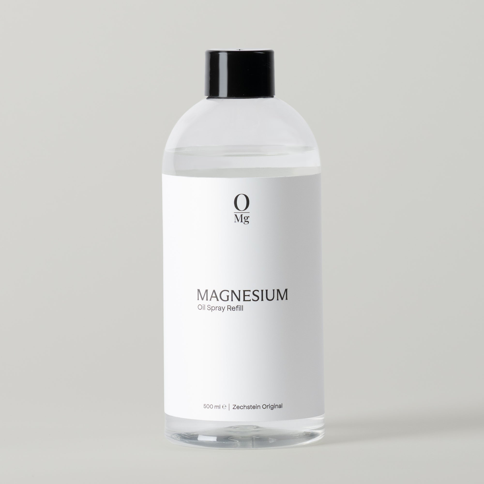 Close-up van onze 500ml navulfles magnesiumolie. Verzorgende magnesium olie, ontsnappende magnesium olie voor je huid.  Verkrijgbaar in onze webshop.